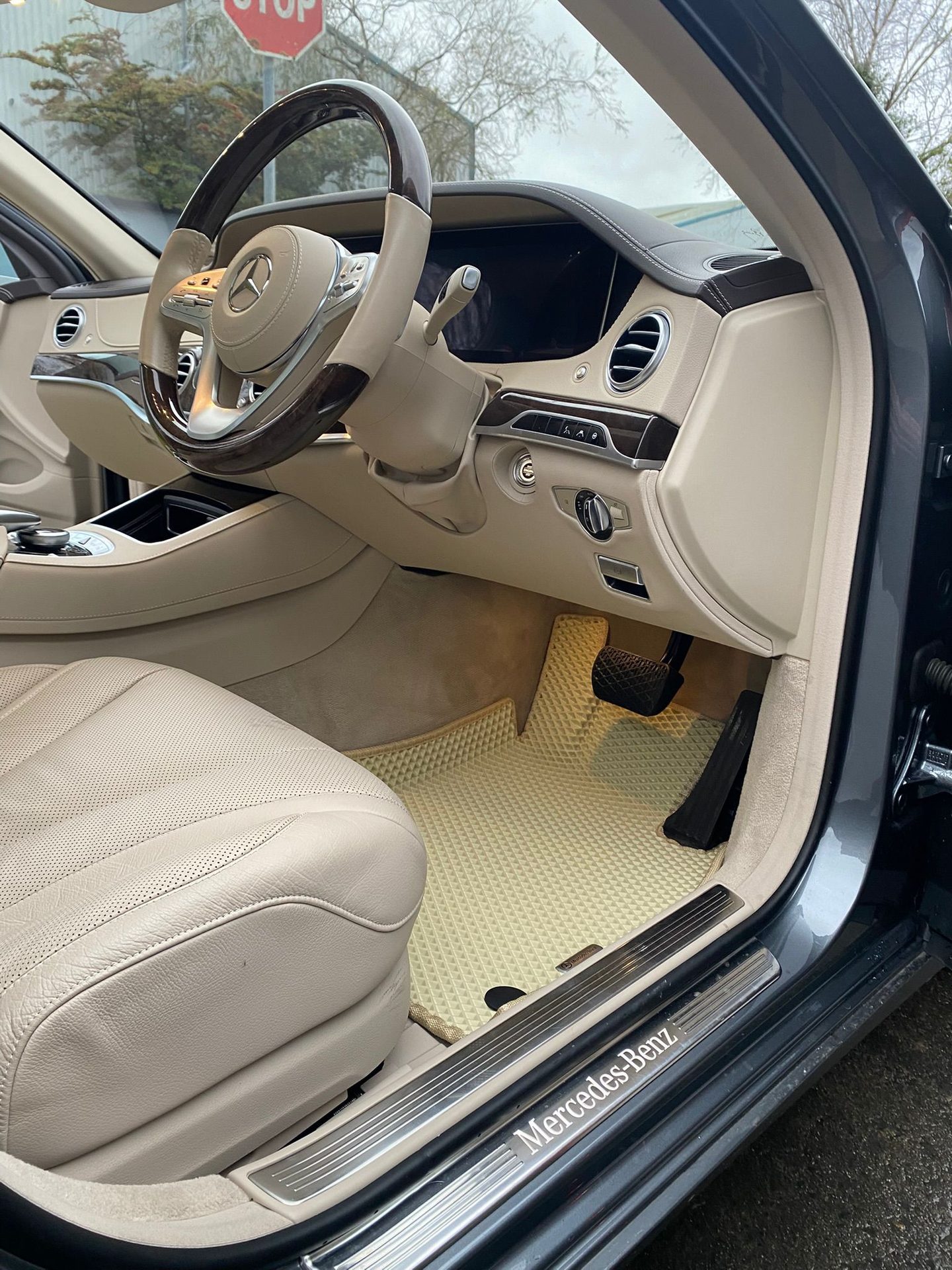 Beige custom EVA mat fitted in a Mercedes-Benz S-Class with cream leather interior